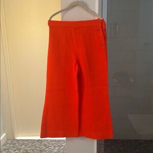 Bright Orange Ladies Flared Trousers.